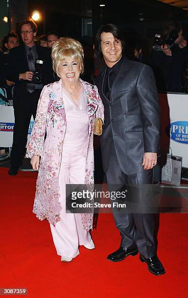 Barbara Windsor and partner arrive at the "Daily Mirror's Pride Of Britain Awards" at the London Hilton Hotel on March 15, 2004 in London. The sixth...