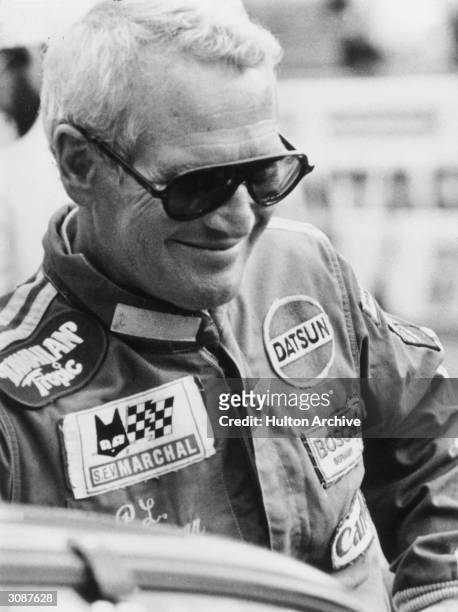 American actor Paul Newman comes in at second place in the 24-hour Le Mans sports car race.