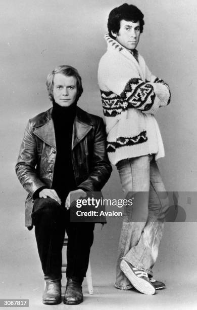 To r, David Soul, who played Hutch and Paul Michael Glaser who played Starsky in the TV series, 'Starsky and Hutch' 1975
