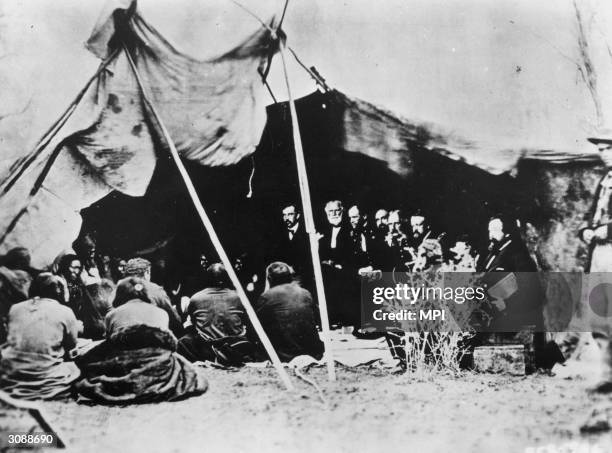 General William Tecumseh Sherman and the Peace Commission meet with Cheyenne and Arapaho Indians at Fort Laramie in Wyoming to try and end Red...