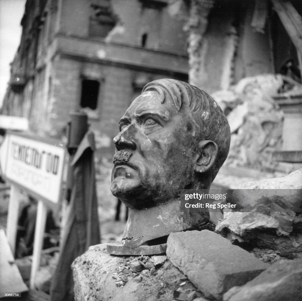 Hitler Rim Shot A bust of Adolf Hitler lies amidst the ruins of the Chancellery ...