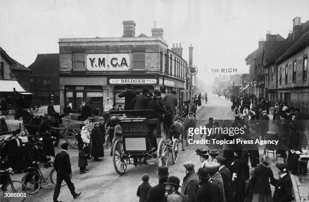 The Vanderbilt coach 'Meteor' drives past the YMCA in Crawley, West Sussex on its first voyage to Brighton.