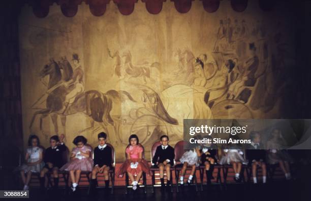 Premium Rates Apply. June 1959: Children at Mrs William de Rham's Dancing Class held at the River Club, New York. L to r, Arturo Ramos Jnr, Constance...