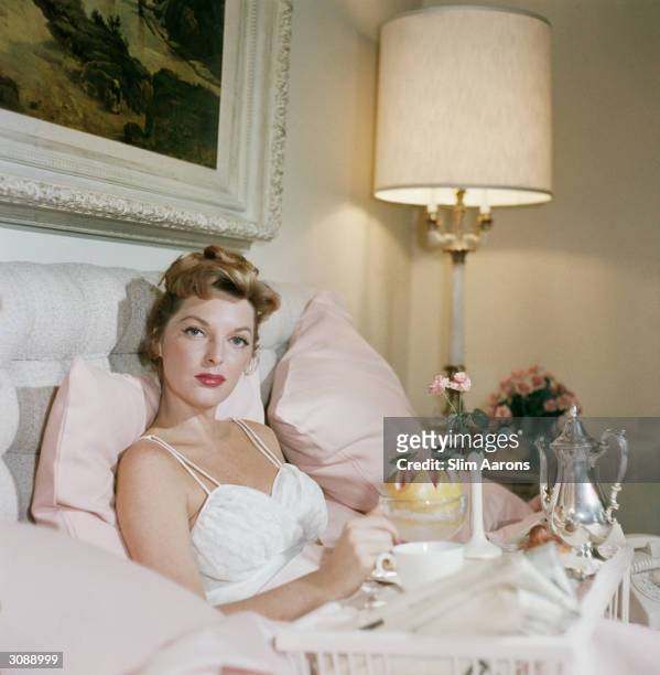 Singer Julie London enjoying breakfast in bed at the Beverly Hills Hotel. A Wonderful Time - Slim Aarons