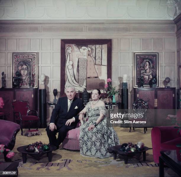 Prince and Princess Archil Gourielli in the living room of their New York apartment. The Princess is Helena Rubinstein founder of the cosmetics...
