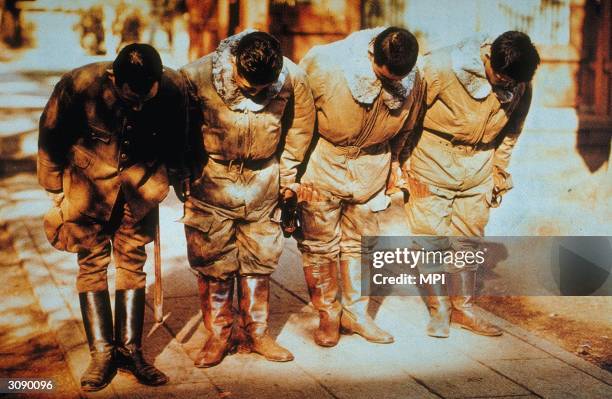 Group of kamikaze pilots bowing.