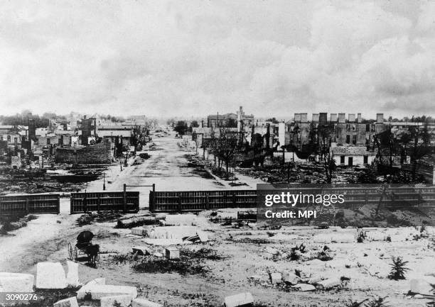 View down debris-strewn Charleston Street, following the departure of Union troops under General Sherman during the Civil War, Columbia, South...