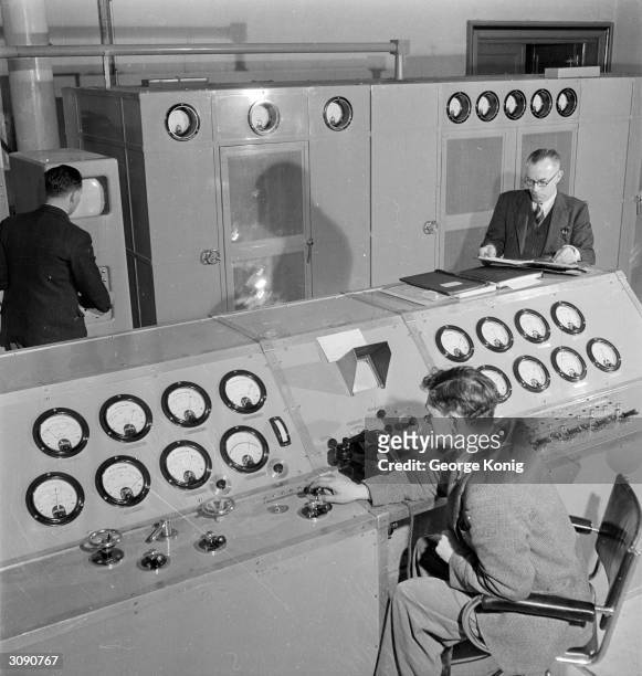 Vision modulators and other equipment in the vision control room of the BBC television station at Alexandra Palace, London. On the right is Mr W G R...