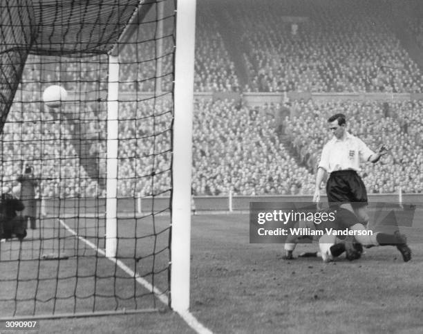 England goalkeeper Gil Merrick fails to save a second goal by Hungary during an FA International match at Wembley Stadium, London. England left back...