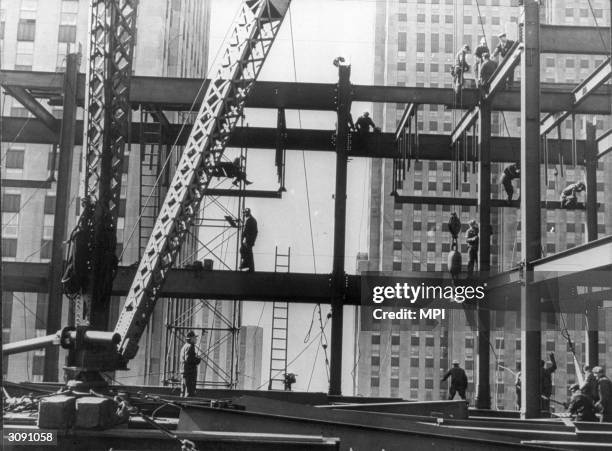 Construction workers building the Esso skyscraper in New York.