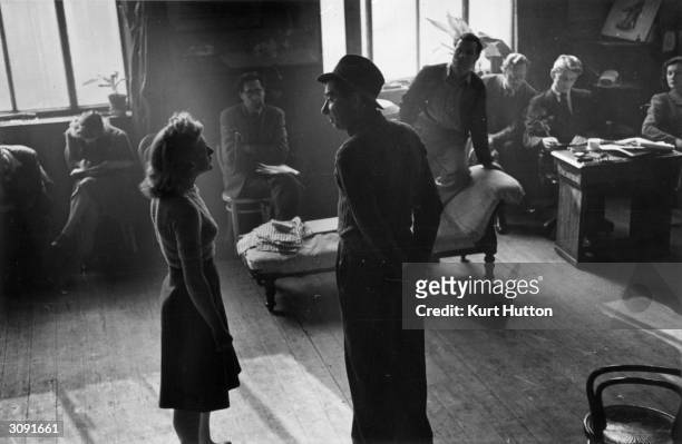 Dora Bryan and Robert Newton rehearse a scene from the play 'Semi-Private' at the Oldham Repertory Theatre in Lancashire. Original Publication:...