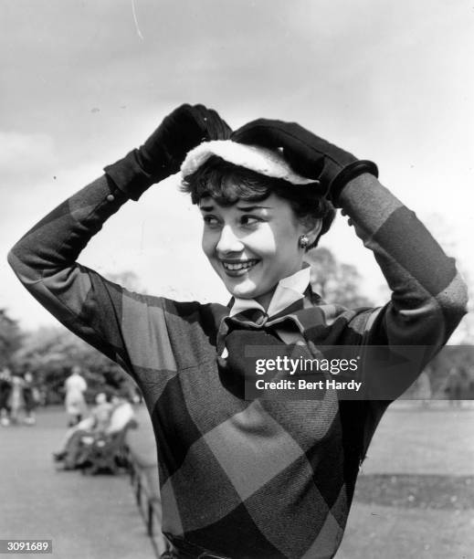 Belgian born actress and humanitarian Audrey Hepburn takes a break from rehearsals in the London revue 'Sauce' for a tour of Kew Gardens and Richmond...
