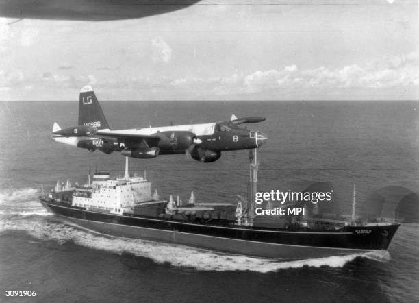 Neptune US patrol plane flying over a Soviet freighter during the Cuban missile crisis.