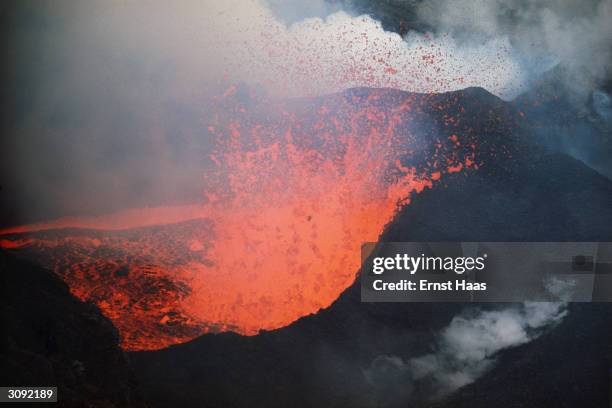 Red hot lava spews from an erupting volcano on Surtsey, a small island off the south coast of Iceland which was formed by a submarine volcanic...