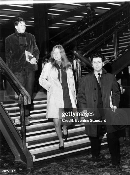 British cellist Jacqueline Du Pre arrives at London Airport with her husband, Argentinian-Israeli conductor and pianist Daniel Barenboim , and the 16...