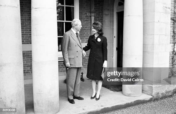 Ex-British prime minister Harold MacMillan ) and Jackie Kennedy , widow of assassinated US president John F Kennedy at Birch Grove, Sussex. Mrs...