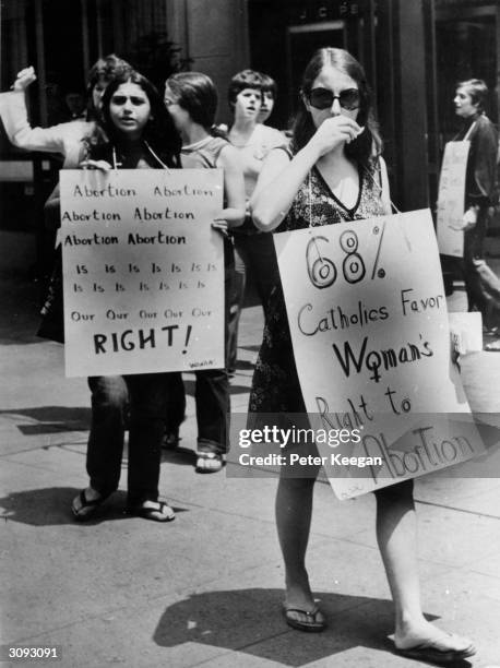 Pro-choice campaigners at a demonstration in favour of abortion in front of the American Hotel in mid-town New York, where the American Medical...