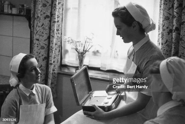 Student nurses at St Bartholomew's Hospital, London. Original Publication: Picture Post - 8859 - The Truth About Teenagers - pub. 1957