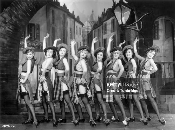 Dance troupe the Windmill Girls performing at the Windmill Theatre, London. The show is 'Paris by Night.. Before 1940' From Revudeville No. 138....