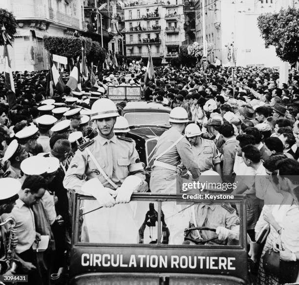 French military policemen in jeeps in a street at Algiers during the revolt by French officers under General Massu during the Algerian War of...