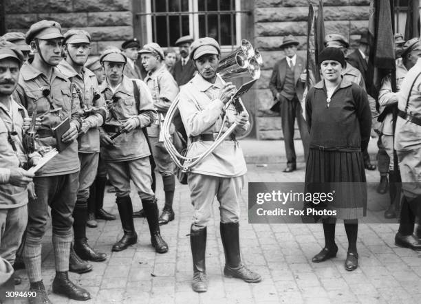 Communist Party band preparing to parade through the streets of Munich.