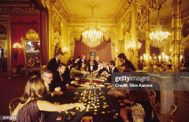 Playing roulette in the luxury casino at Baden-Baden, south west Germany.