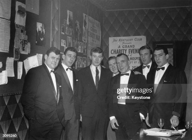 London gangster twins Ronald and Reginald Kray with their brother Charles at the Kentucky Club after the Premiere of 'Sparrows Can't Sing'.