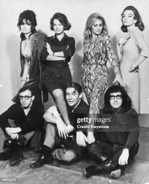 Seven stars of Woody Allen's film 'What's New Pussycat' in Paris. Seated, left to right, Woody Allen, Peter O'Toole and Peter Sellers , standing...