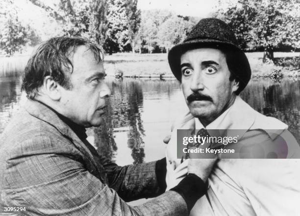 Peter Sellers and Herbert Lom starring in 'The Pink Panther Strikes Again' as the mishap prone Parisian Inspector Jacques Clouseau and Dreyfus.