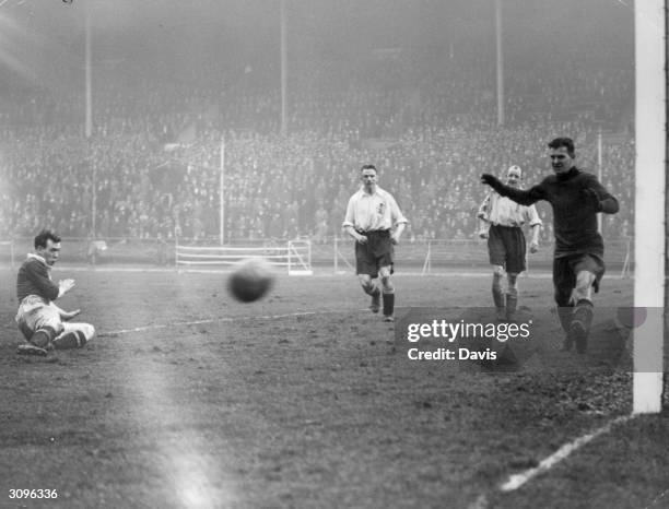 Scottish footballer Gallacher tries for a goal during the International soccer match between England and Scotland. The team was captained by Jimmy...