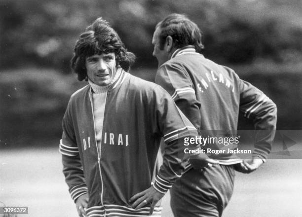 England footballer Kevin Keegan and the team manager, Don Revie, during a training session before a game against Scotland.
