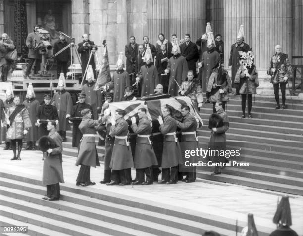 Pallbearers carry Sir Winston Churchill's coffin down the steps of St Paul's Cathedral, London, after the funeral service.