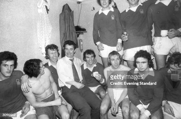 Nottingham Forset manager Brian Clough in the dressing room with members of his team, amongst them is the future Leicester City manager Martin...