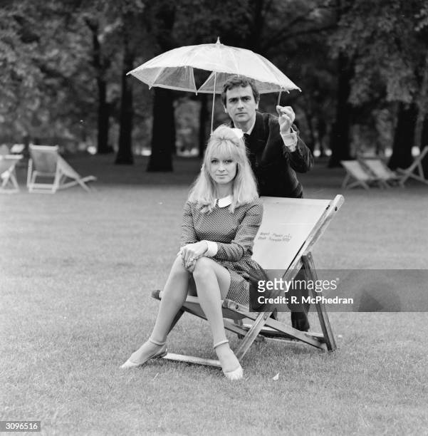 Model and actress Suzy Kendall with her husband, the actor and comedian, Dudley Moore , in Hyde Park.