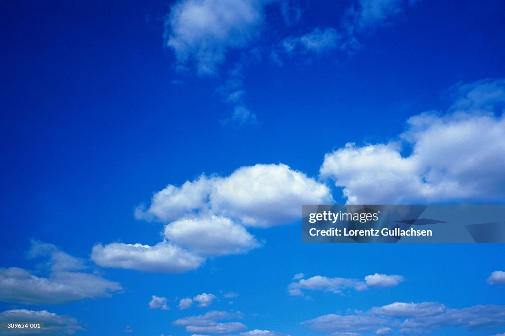 Cumulus clouds in blue sky