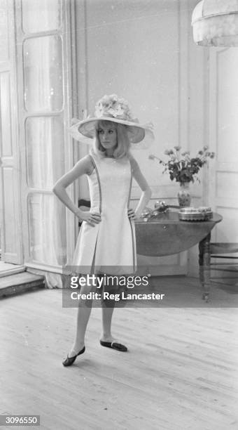 French actress Catherine Deneuve, who is appearing in the new Gene Kelly film 'Les Demoiselles de Rochefort'.