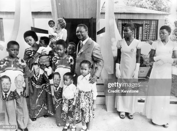 Jean Bedel Bokassa, Emperor Bokassa of the Central African Republic with his family. A photograph taken to show that he was a loving family man after...