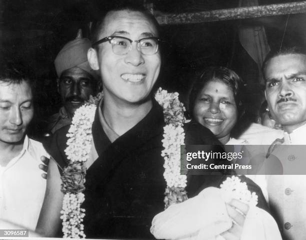 The 14th Dalai Lama, Tenzin Gyatso, spiritual and temporal ruler of Tibet, arrives in Delhi, on his first visit to the Indian capital since he sought...