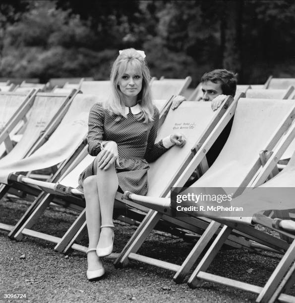 Model and actress Suzy Kendall with her husband, the actor and comedian, Dudley Moore , in Hyde Park.