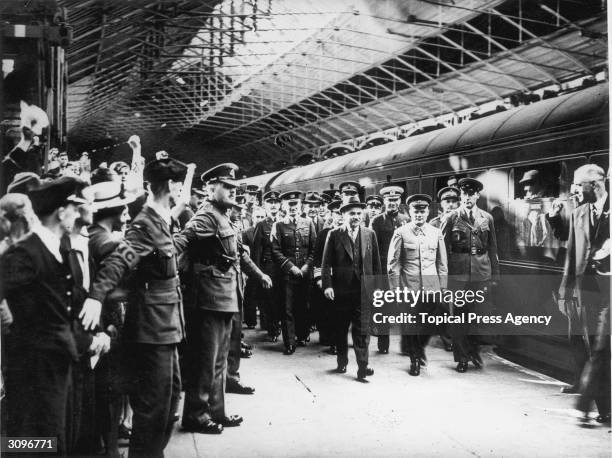 Russian commander, Lt General Golikov Deputy Chief of General Staff and leader of the mission with Mr Maisky, Soviet Ambassador being greeted at...