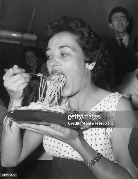 Pamela English of Maida Vale competes in a spaghetti eating contest at a restaurant in Frith Street, Soho, London.