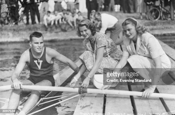 American actress Grace Kelly with her sister, Elizabeth and her brother, John B Kelly Jnr at Henley Royal Regatta, Henley-on-Thames.