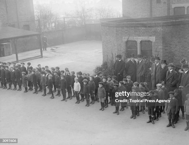 Schoolboys from St John's School in Ealing, London.