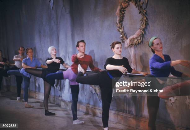 Australian dancer, choreographer and actor Robert Helpmann with ballerina Ludmilla Tcherina at the wall bar during rehearsals for the dance scenes in...