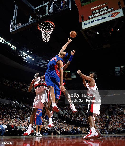 Rasheed Wallace of the Detroit Pistons goes up for a rebound during the game against the Portland Trail Blazers at The Rose Garden on March 4, 2004...