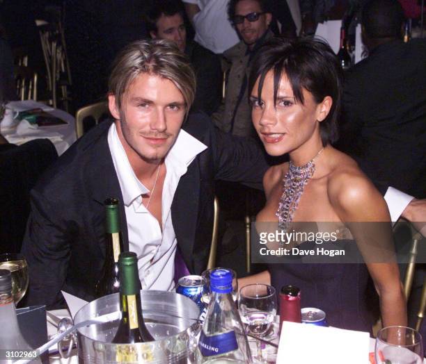 British football star David Beckham and his wife British pop star Victoria Beckham attend the MOBO Awards held at the Royal Albert Hall on October 6,...