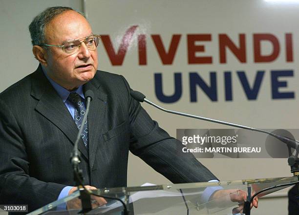 Chief Executive and Financial Chief of Vivendi Jacques Espinasse presents during a press conference in Paris, 17 March 2004 in Paris, the group...