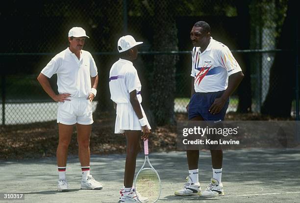 Venus Williams receives instructions from her father Richard and coach Rick Macci in Florida. Mandatory Credit: Ken Levine /Allsport