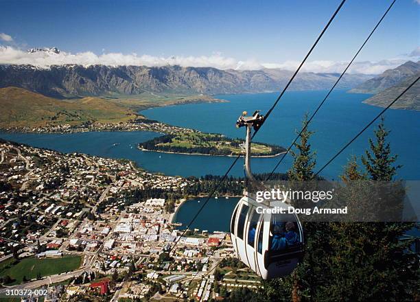 new zealand,queenstown,cable car and view over city and lake - クイーンズタウン ストックフォトと画像