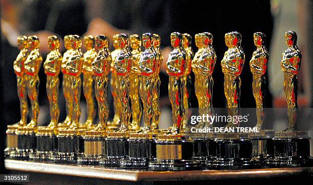 The 22 Oscars won by the Lord of The Rings sit on a table in front of the 3000 assembled fans that turned out to see director Peter Jackson and the...